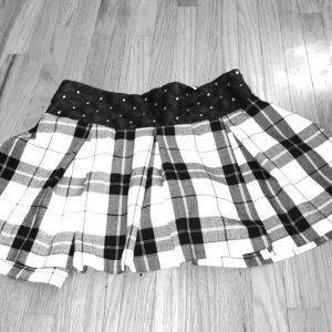 Black and white leather and plain skirt